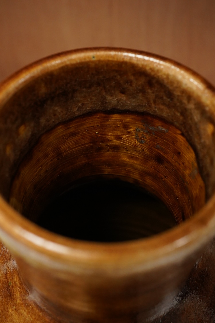 Guido Gamobone (Italian 1909-1969), a large multi coloured striped glazed earthenware vase signed,38cm high
